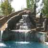 Rock swimming pool slide